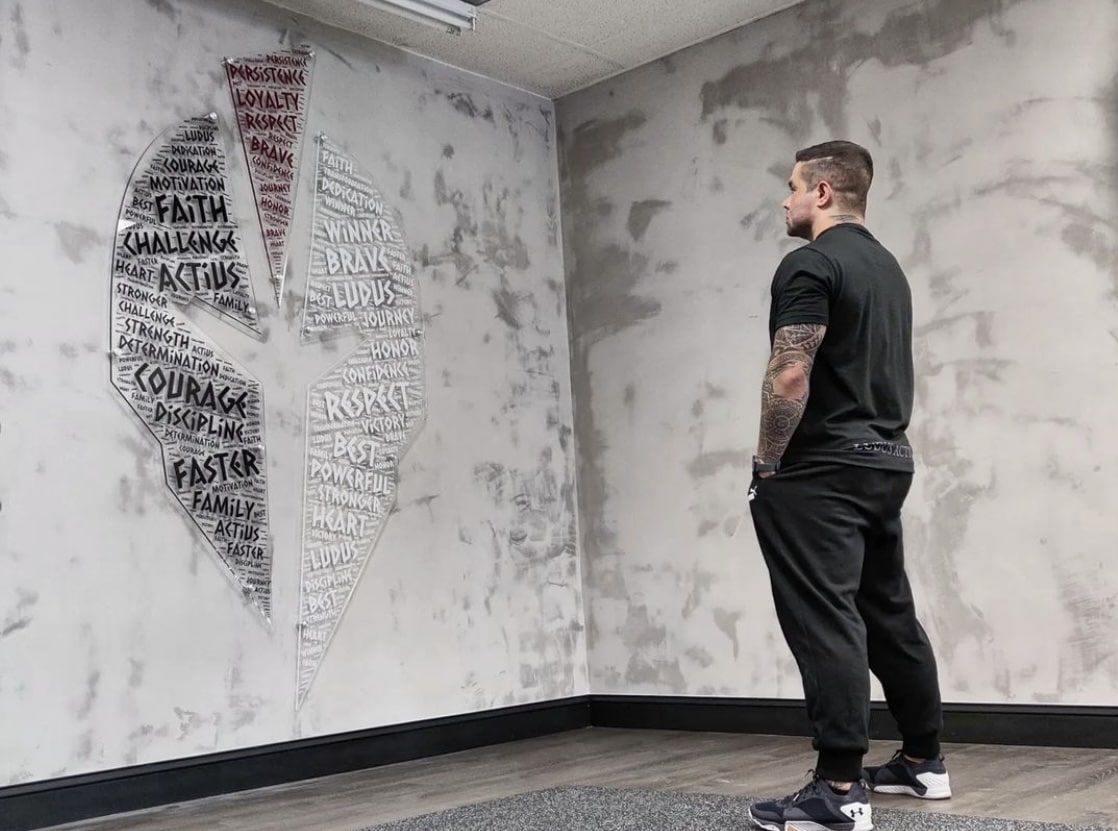 The values painted on the studio wall, read by a member